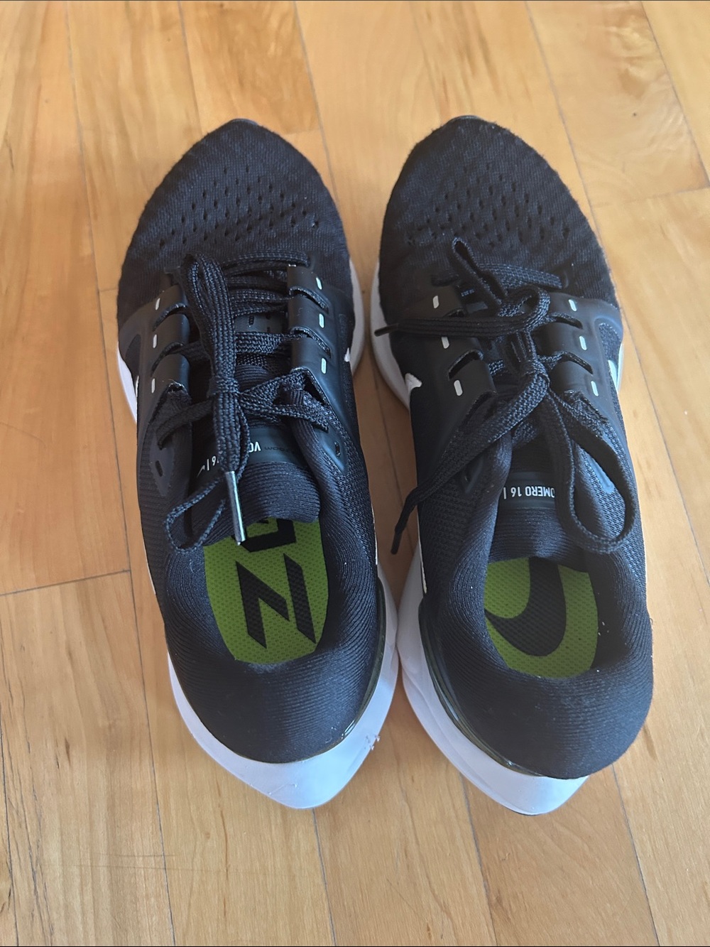Nike Black Athletic Running Sneakers with White Sole and Green Insole